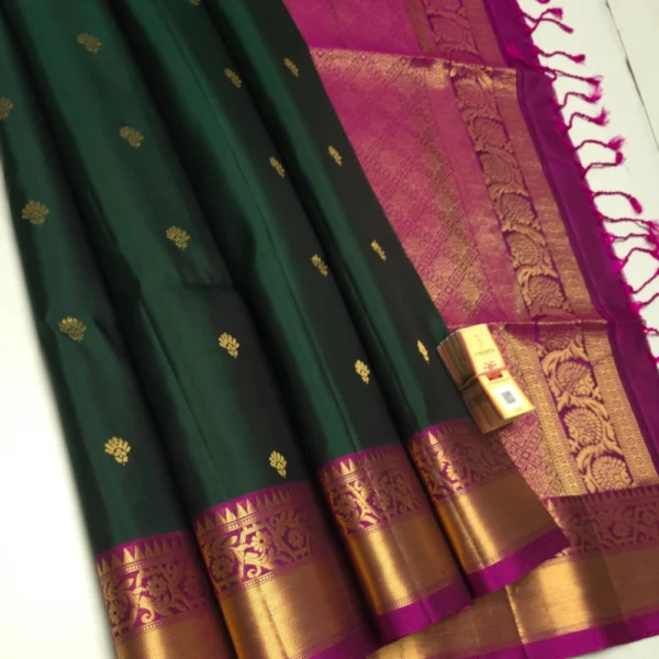 Pure handloom Silk Saree in Bottle Green with Pink Border